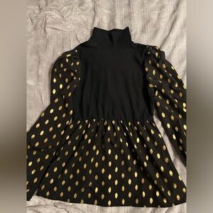 Black and gold turtleneck blouse